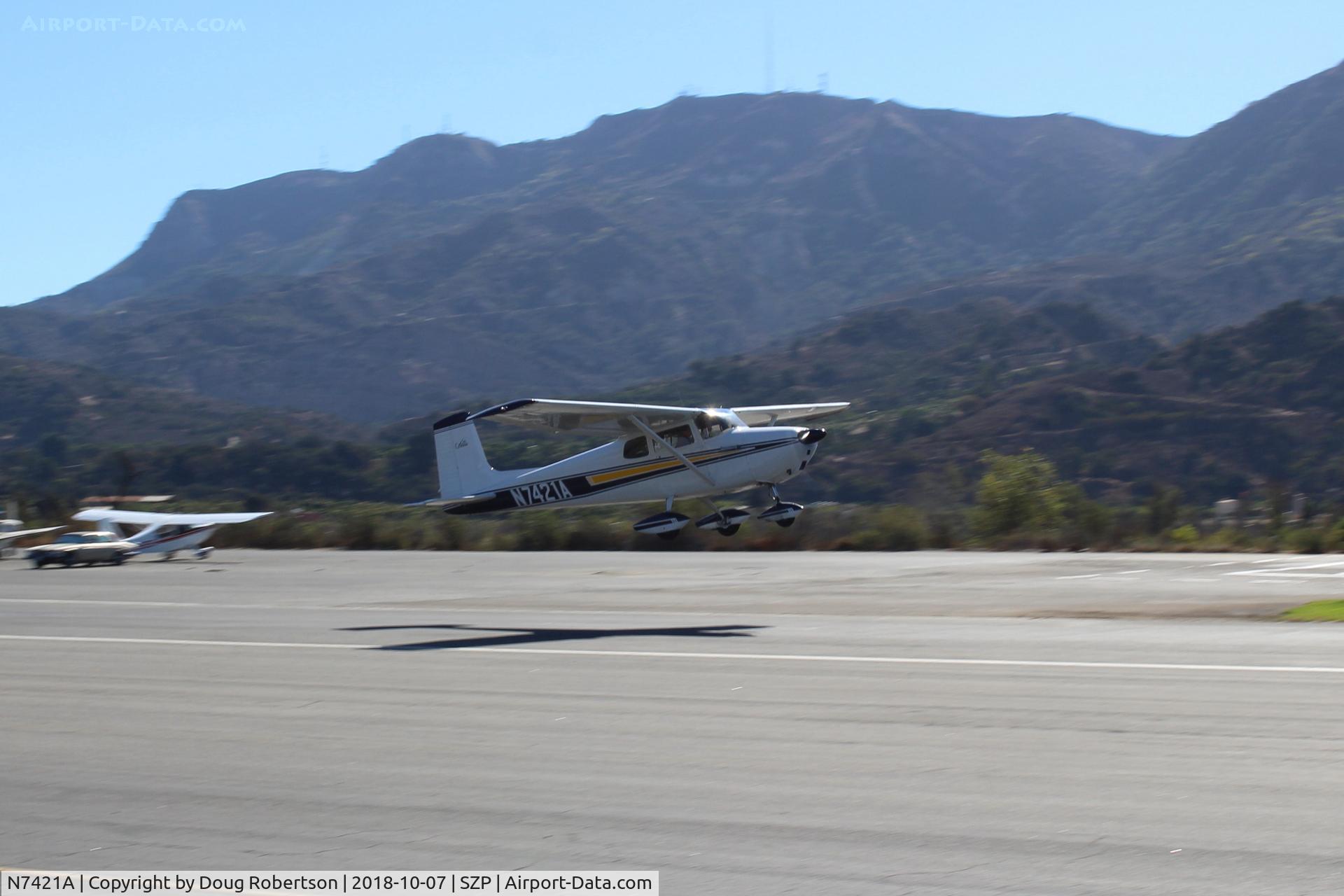 N7421A, 1956 Cessna 172 C/N 29521, 1956 Cessna 172, Continental O-300 145 Hp, takeoff climb Rwy 22. This aircraft NOT a Skyhawk.