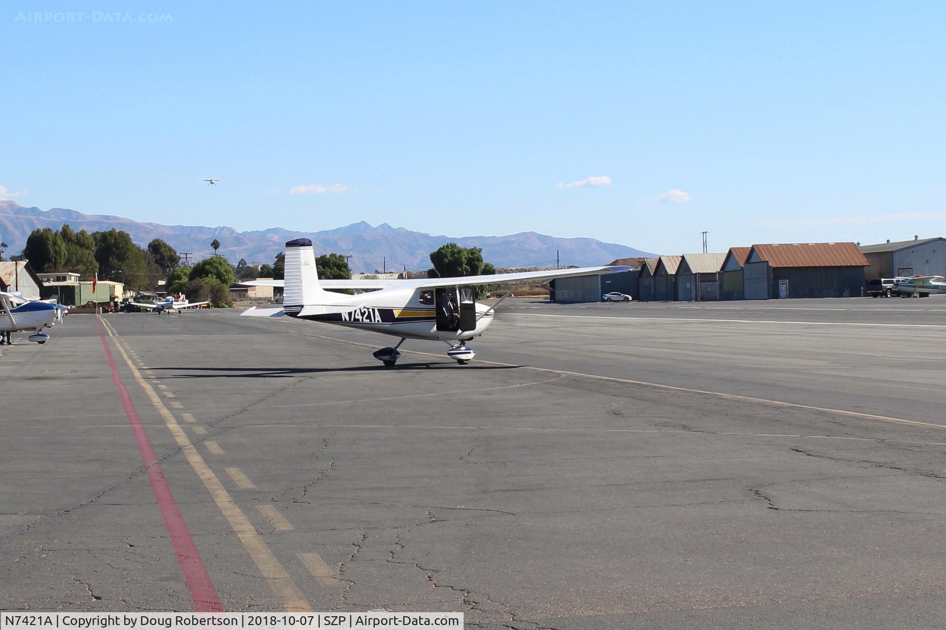 N7421A, 1956 Cessna 172 C/N 29521, 1956 Cessna 172, Continental O-300 145 Hp, departing the Transient Ramp