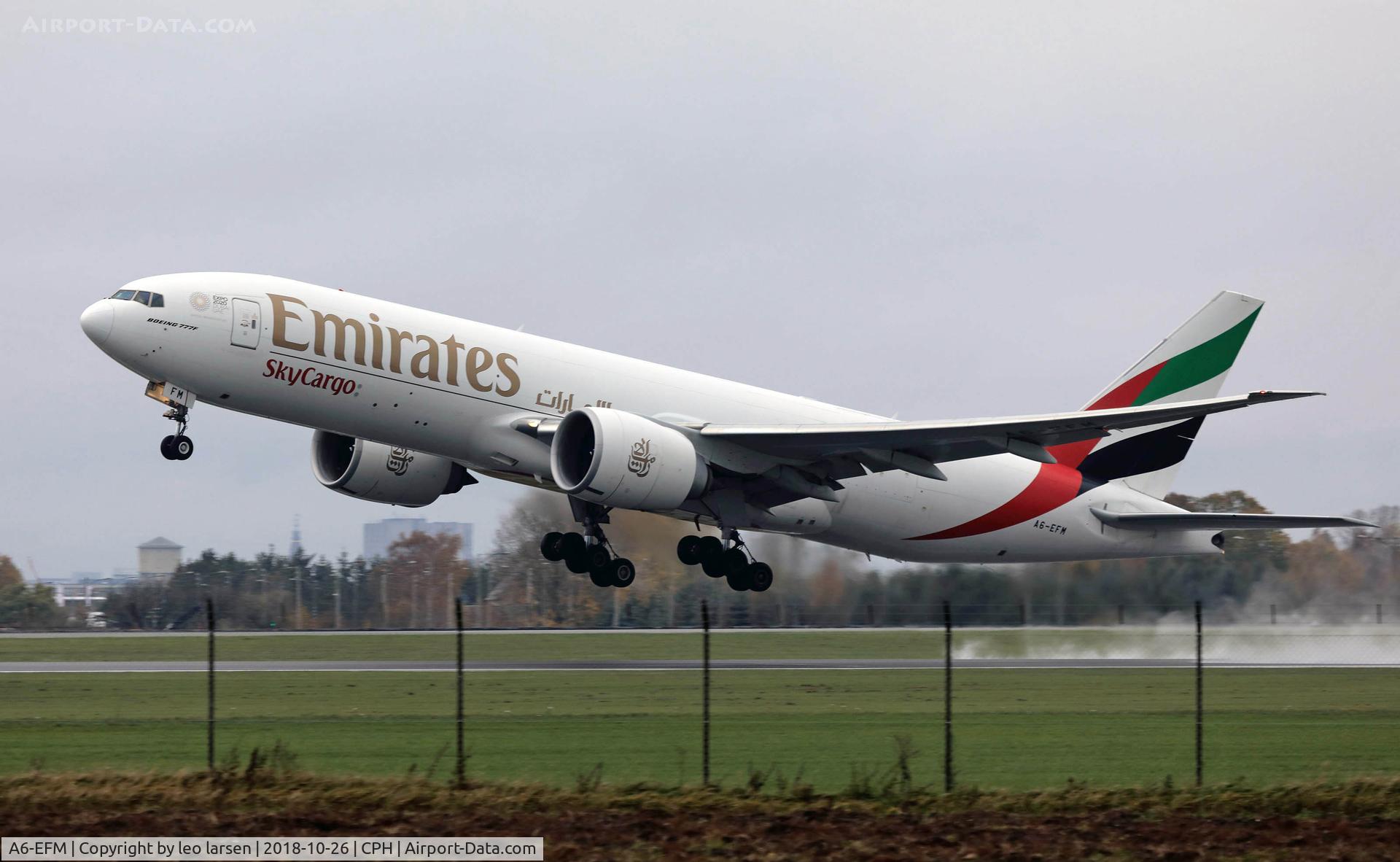 A6-EFM, 2013 Boeing 777-F1H C/N 42231, Copenhagen 26.10.2018 T/O R-22R on a rainy day.