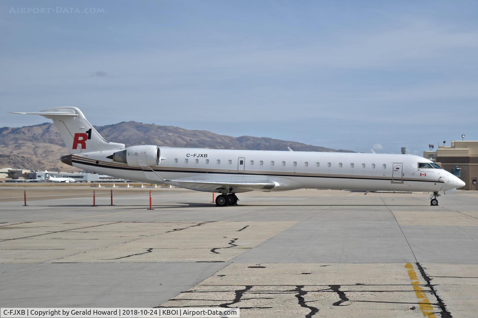 C-FJXB, 1999 Bombardier CRJ-701 (CL-600-2C10) Regional Jet C/N 10004, Parked on south GS ramp.