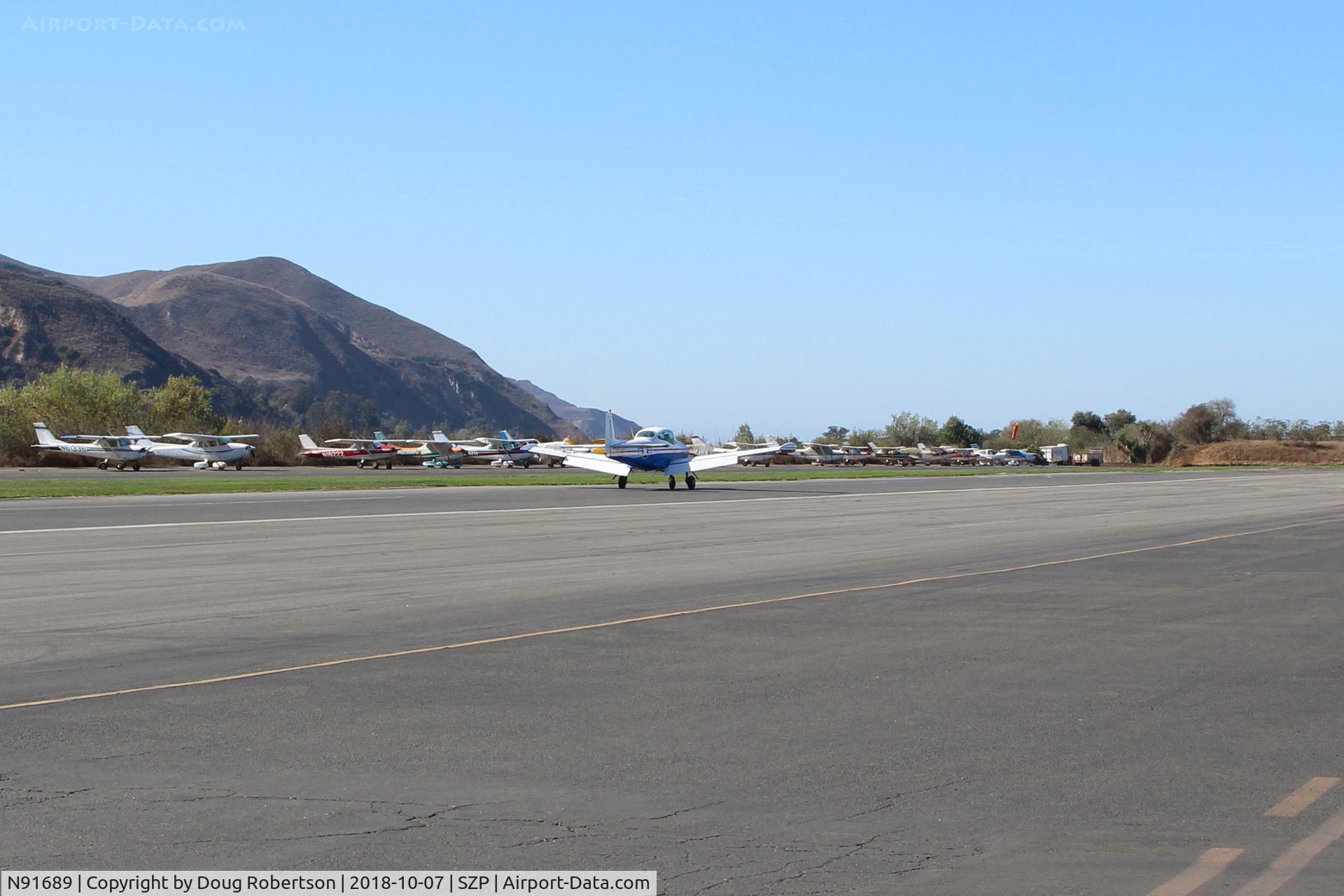 N91689, 1946 North American Navion (NA-145) C/N NAV-4-431, 1946 North American NAVION, Continental E225 upgrade, landing roll Rwy 22, Young Eagles flight