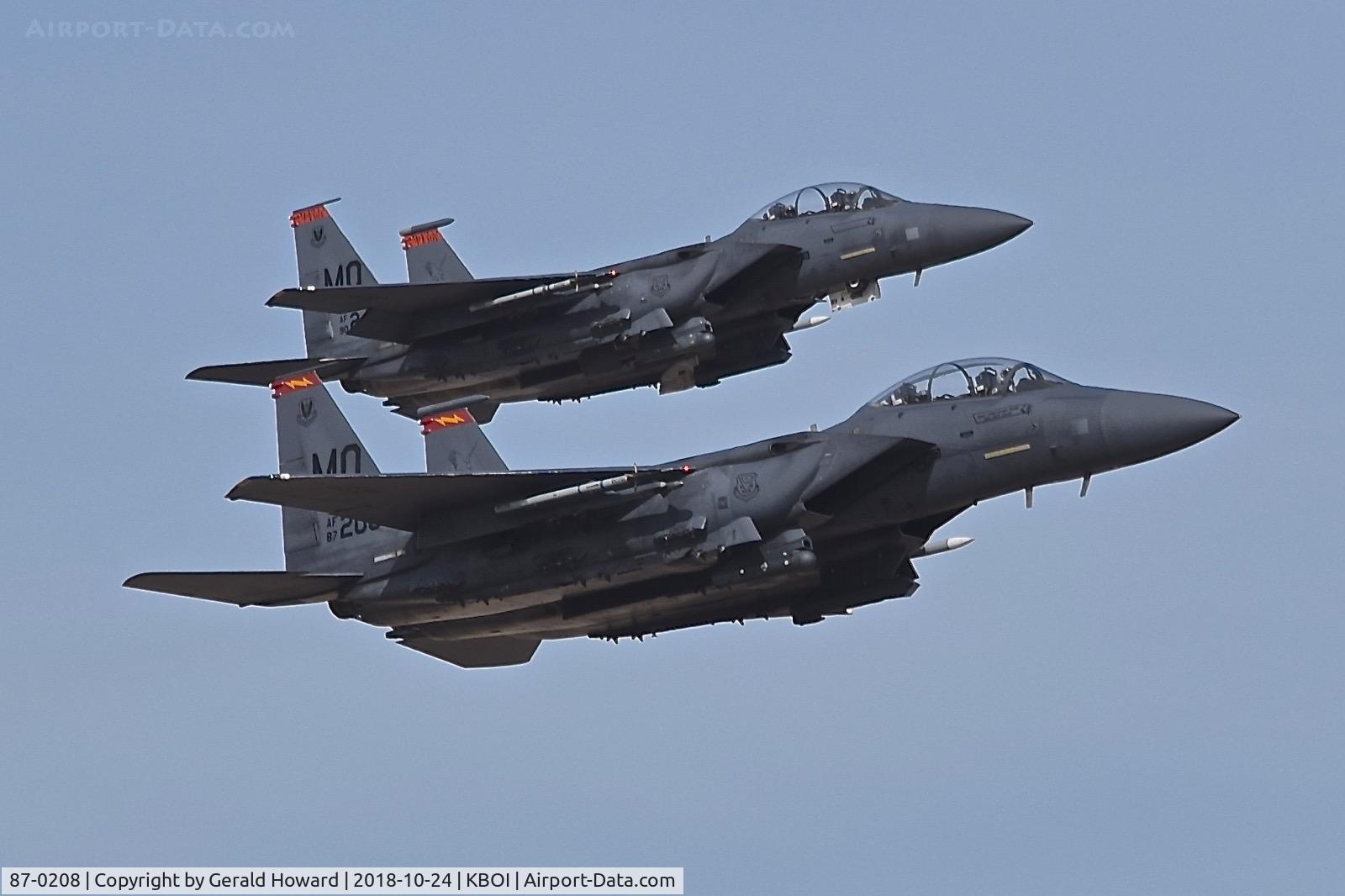 87-0208, 1987 McDonnell Douglas F-15E Strike Eagle C/N 1073/E048, Making a low approach to RWY 10R with 90-0246. 366th Fighter Wing, Mountain Home AFB, Idaho.