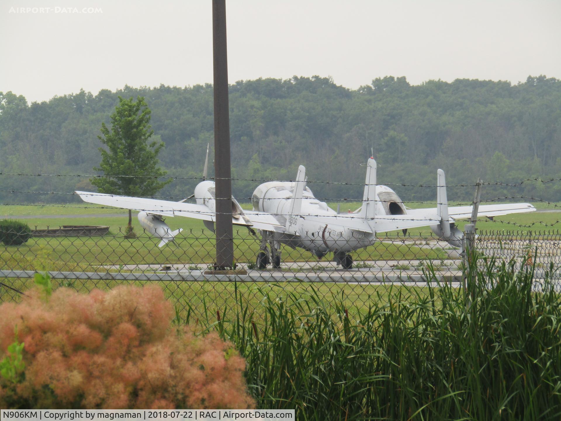 N906KM, 1967 Grumman OV-1C Mohawk C/N 900, shot from car park in front of terminal