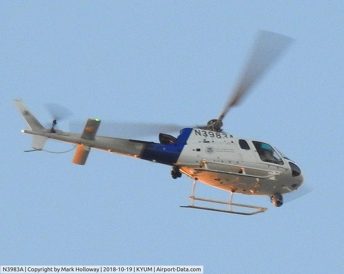 N3983A, 2011 Eurocopter AS-350B-3 Ecureuil C/N 7101, Helicopter providing security at Yuma International Airport for Vice President Mike Pence who was at a rally in a hangar.