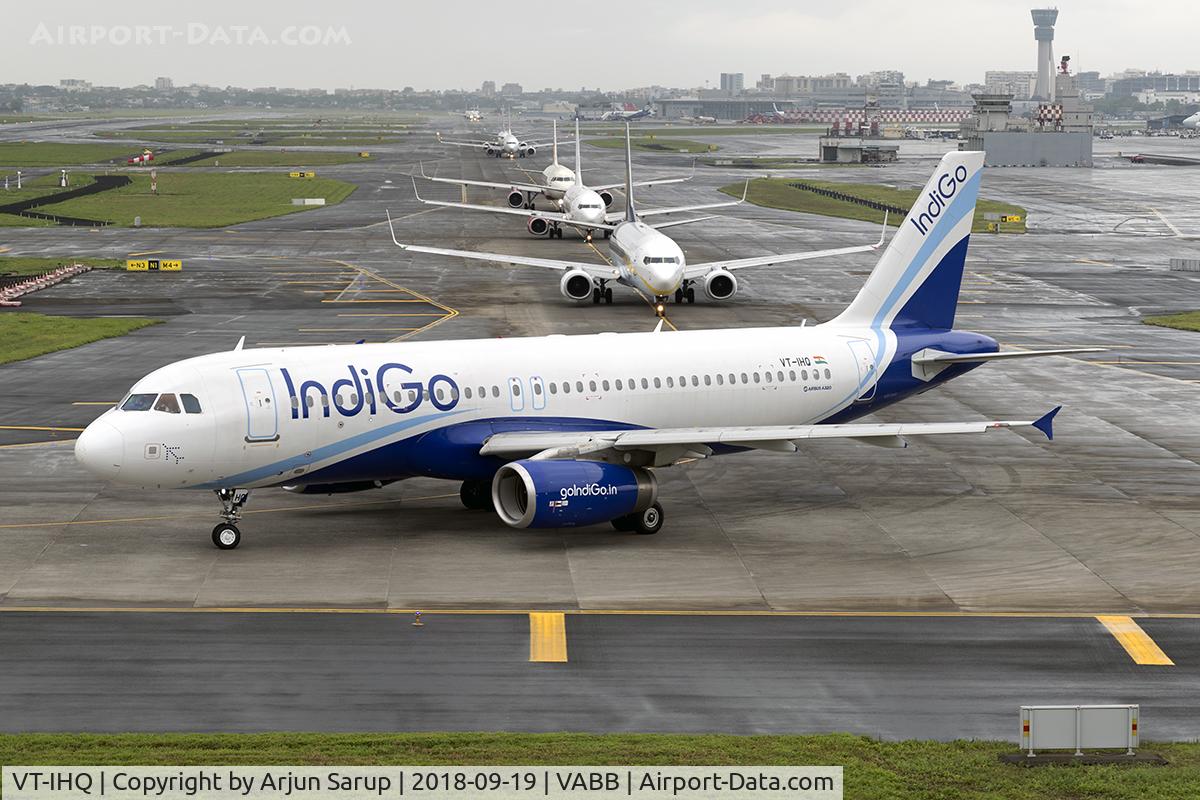 VT-IHQ, Airbus A320-232 C/N 2670, Former Jetstar Pacific A320 taxiing out for departure to Ahmedabad as 6E213 on an overcast morning.  Aircraft of Jet Airways, SpiceJet and Air India follow down TWY N1.