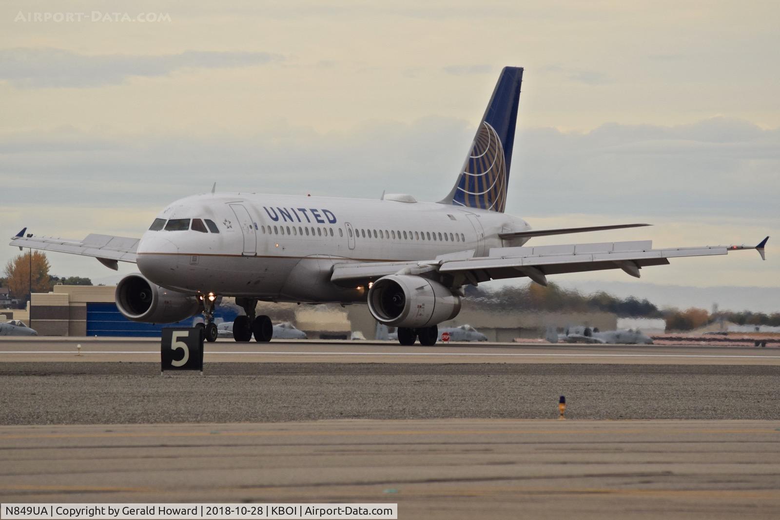 N849UA, 2002 Airbus A319-131 C/N 1649, Landing roll out on RWY 10L.