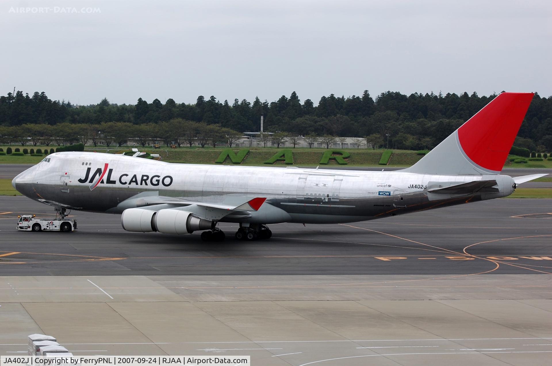 JA402J, 2004 Boeing 747-446F C/N 33749, JAL Cargo B744F under tow to the maintenance area