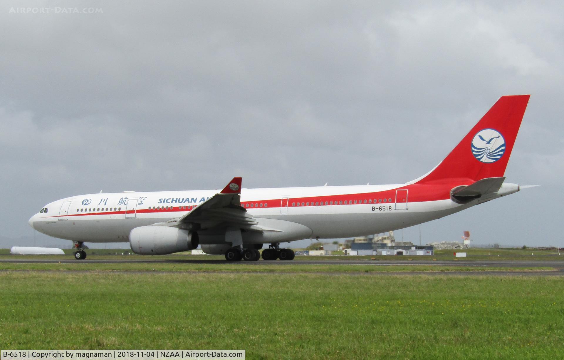 B-6518, 2010 Airbus A330-243 C/N 1082, taxying out to leave
