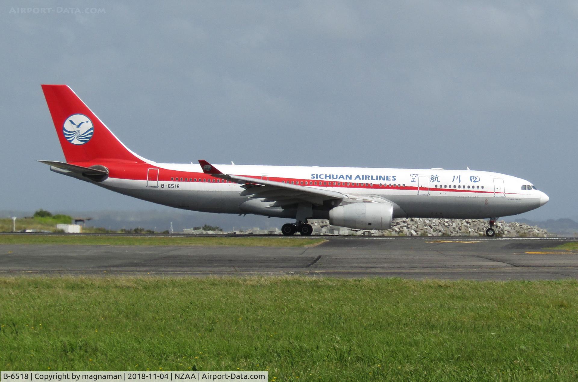 B-6518, 2010 Airbus A330-243 C/N 1082, leaving AKL