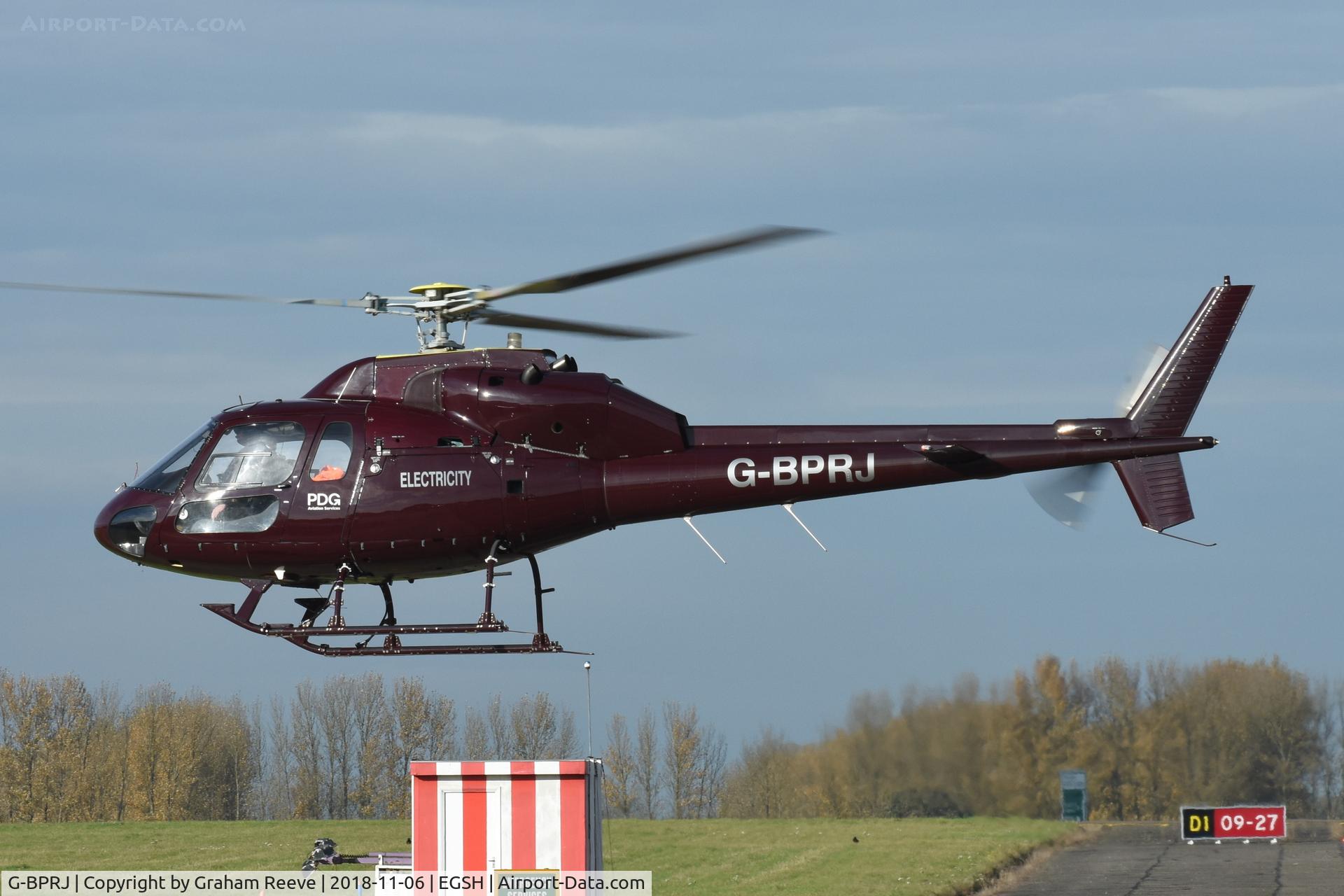 G-BPRJ, 1982 Aerospatiale AS-355F-1 Ecureuil 2 C/N 5201, Landing at Norwich.