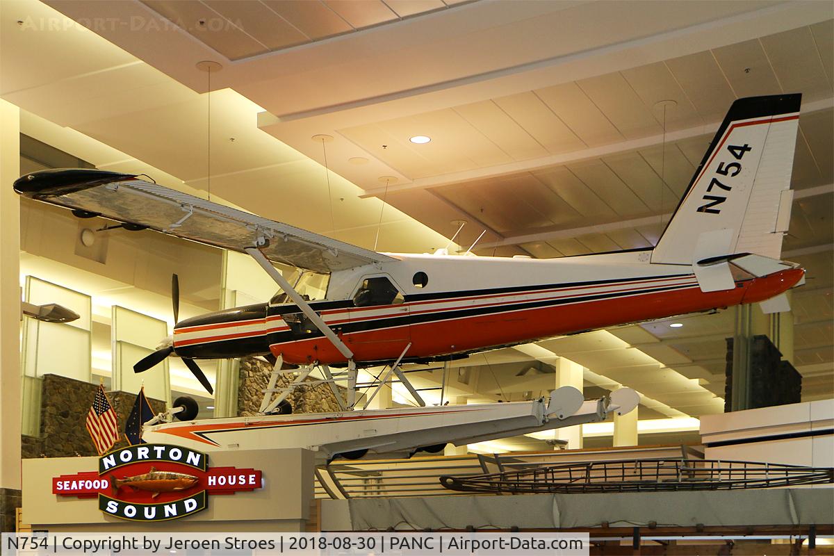 N754, 1965 De Havilland Canada U-6A Beaver C/N 1207, behind the custom at PANC