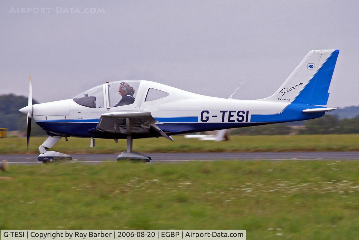 G-TESI, 2006 Tecnam P-2002EA Sierra C/N PFA 333-14481, G-TESI   Tecnam P.2002 Sierra [PFA 333-14481] Kemble~G 20/08/2006. Just landed flaps down and different pilot compared to the other picture.
