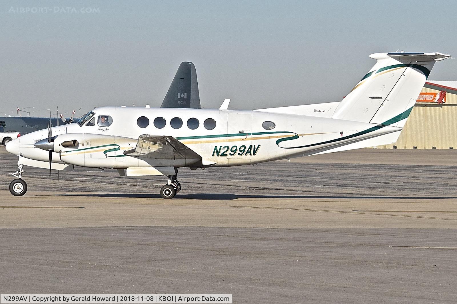 N299AV, 1999 Raytheon Aircraft Company B200 C/N BB-1680, Taxiing from the north GA ramp to Alpha.