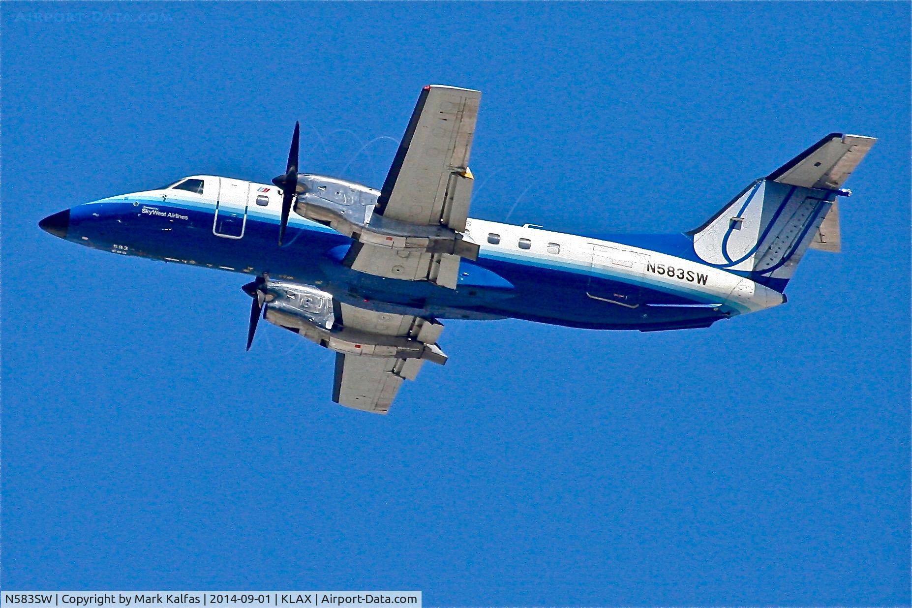 N583SW, 1999 Embraer EMB-120ER Brasilia C/N 120351, Departing 25R LAX>