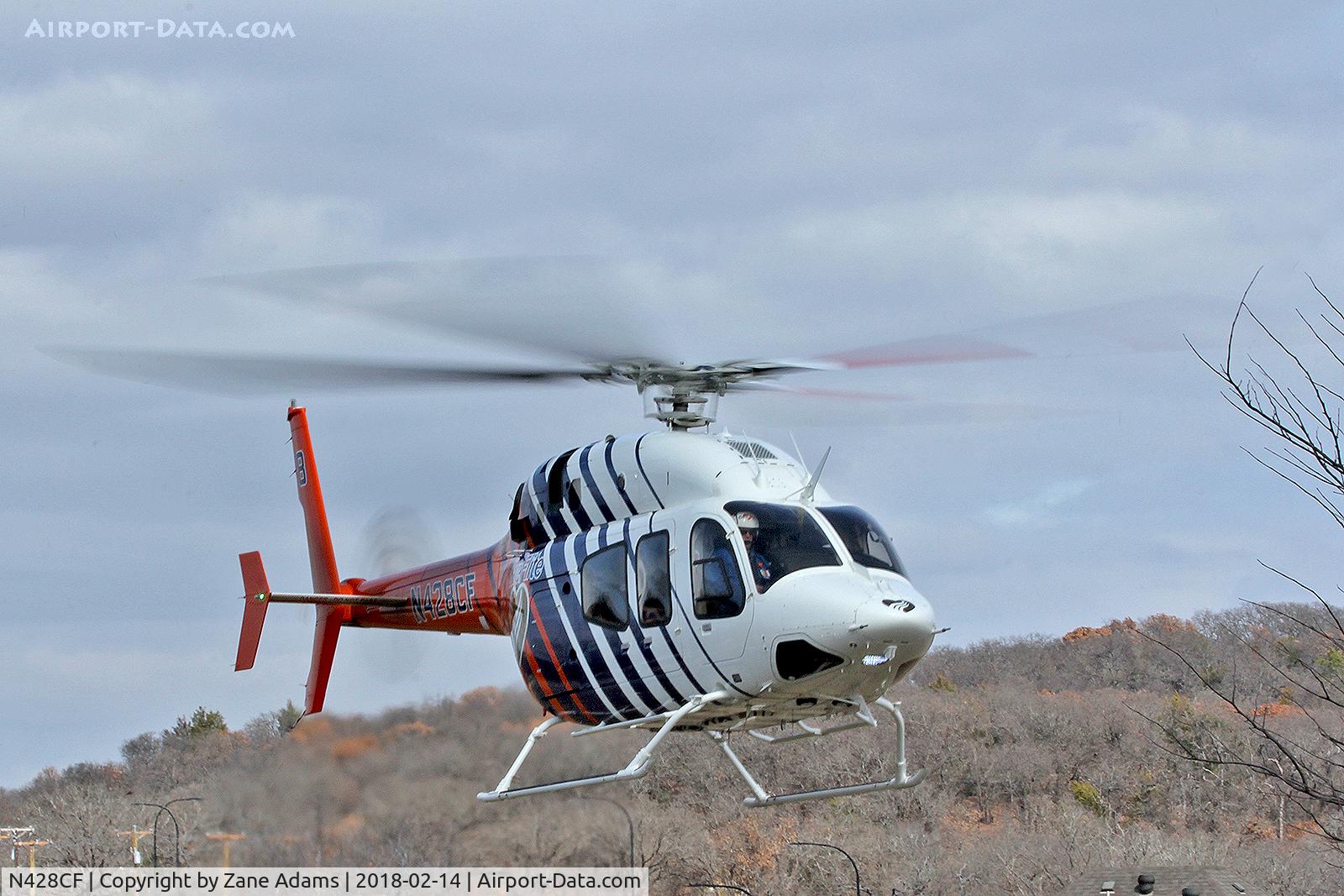 N428CF, 2014 Bell 429 GlobalRanger C/N 57228, CareFlite departing vacant lot in Kennedale, TX
