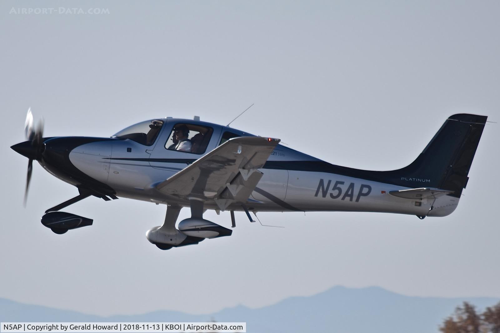 N5AP, 2014 Cirrus SR-22T C/N 0759, Climb out from RWY 10L.
