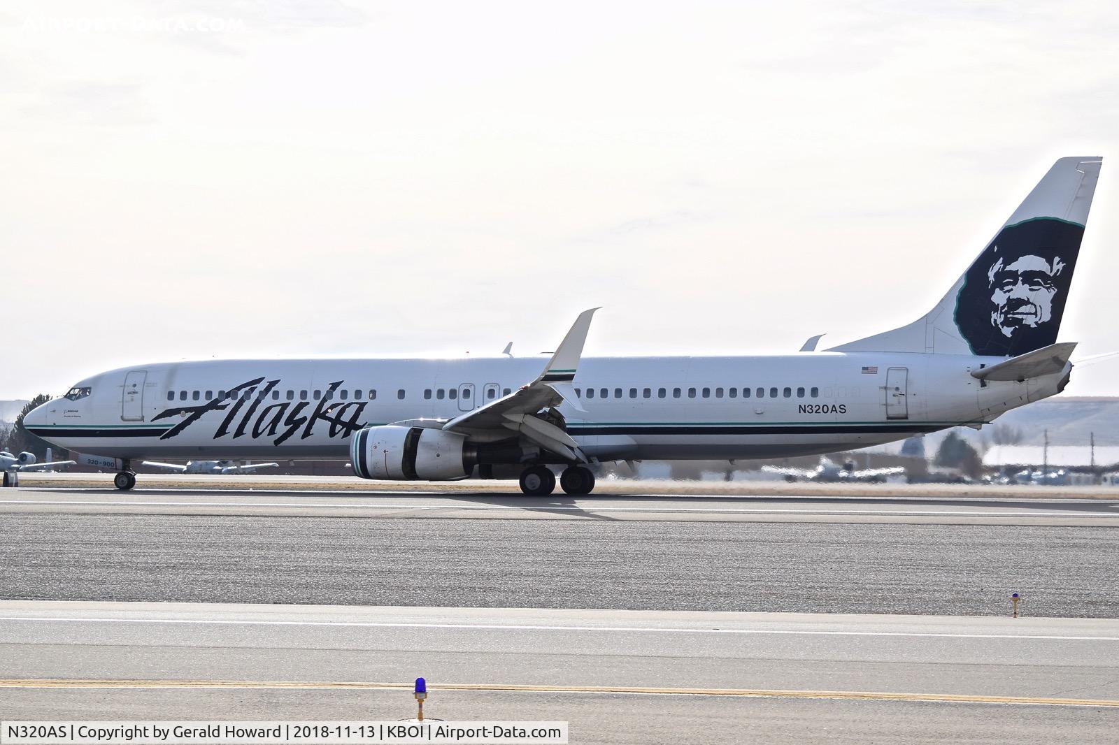 N320AS, 2003 Boeing 737-990 C/N 33680, Landing roll out on RWY 10L.