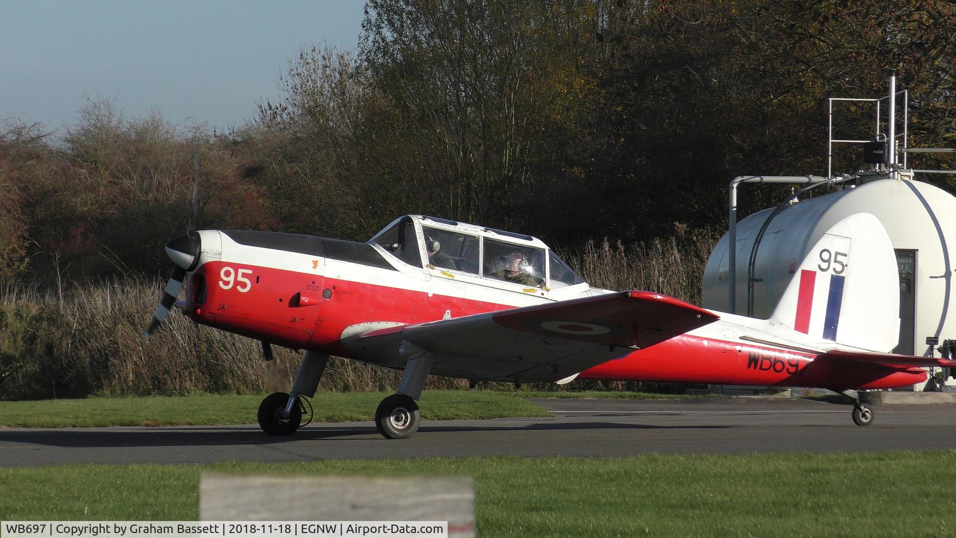 WB697, 1950 De Havilland DHC-1 Chipmunk T.10 C/N C1/0145, Taxying at Wickenby Aerodrome to the active runway for take off.