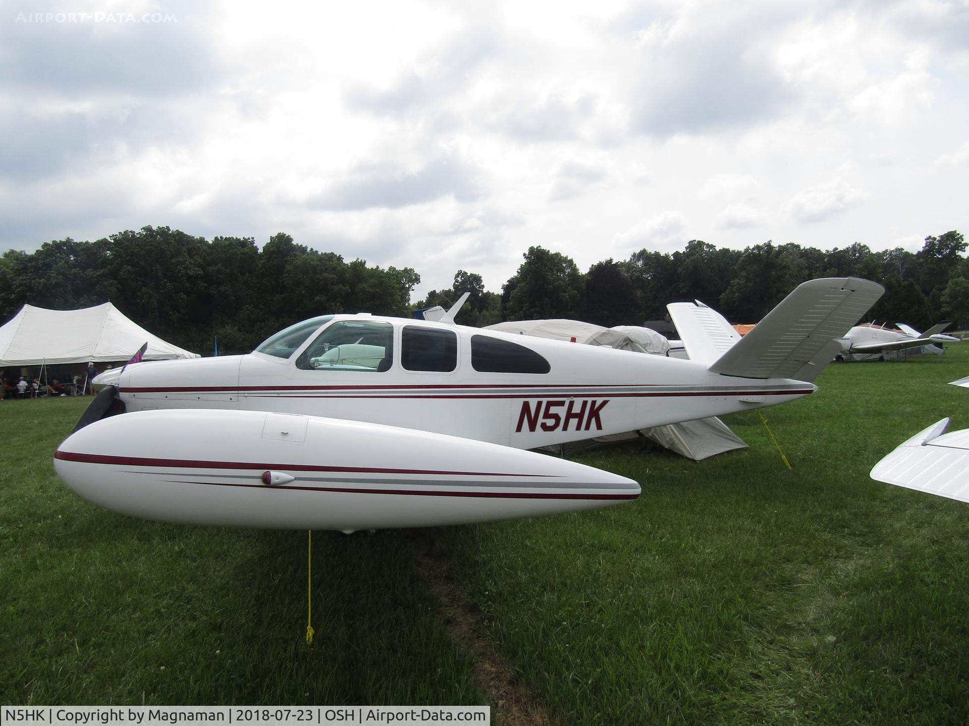 N5HK, 1957 Beech H35 Bonanza C/N D-4914, close enough to the wing tip?