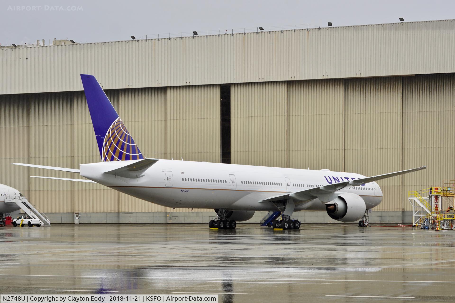 N2748U, 2018 Boeing 777-300/ER C/N 64994, First rain of the season. SFO 2018.