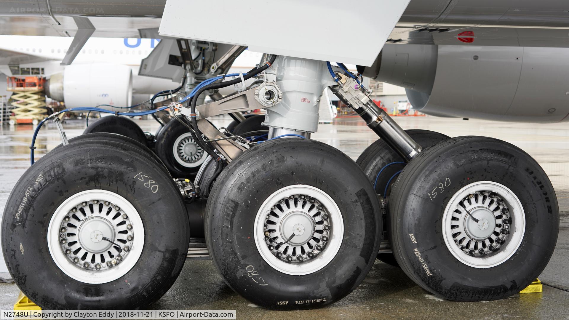 N2748U, 2018 Boeing 777-300/ER C/N 64994, First rain of the season. SFO 2018.