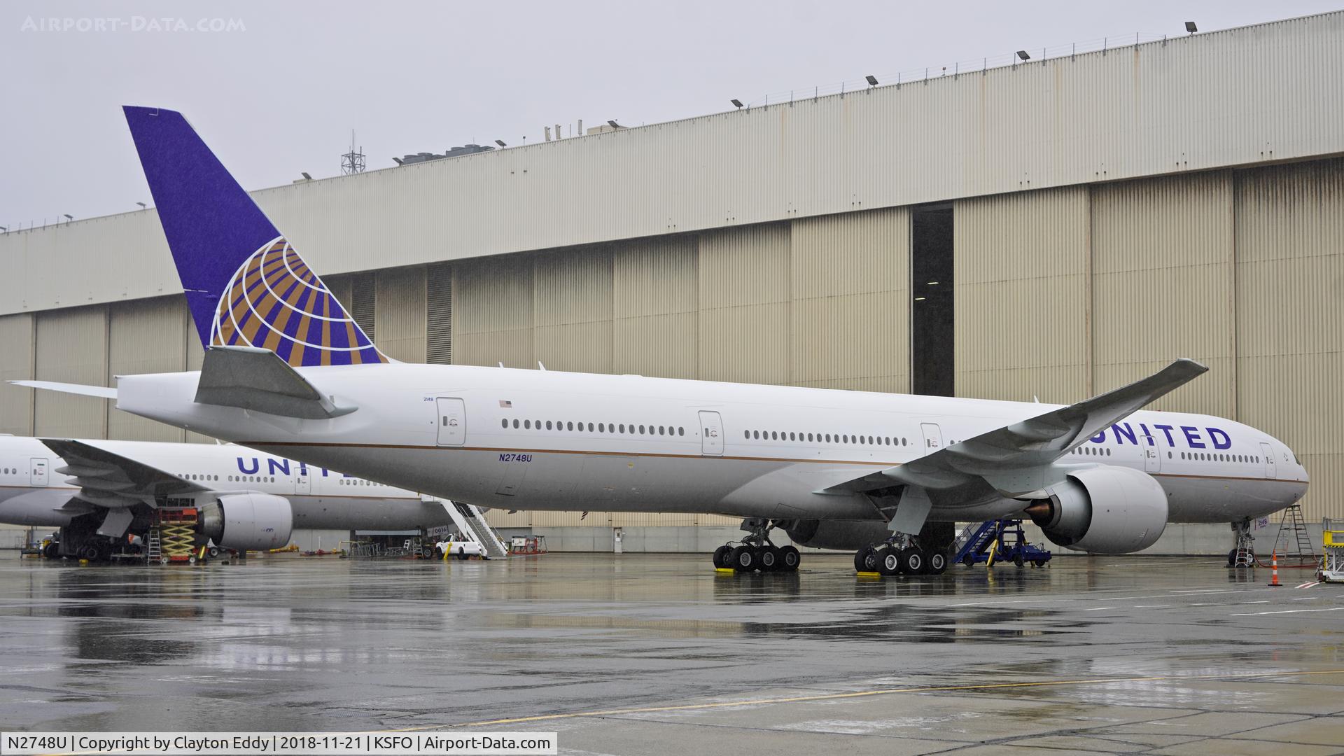 N2748U, 2018 Boeing 777-300/ER C/N 64994, First rain of the season. SFO 2018.