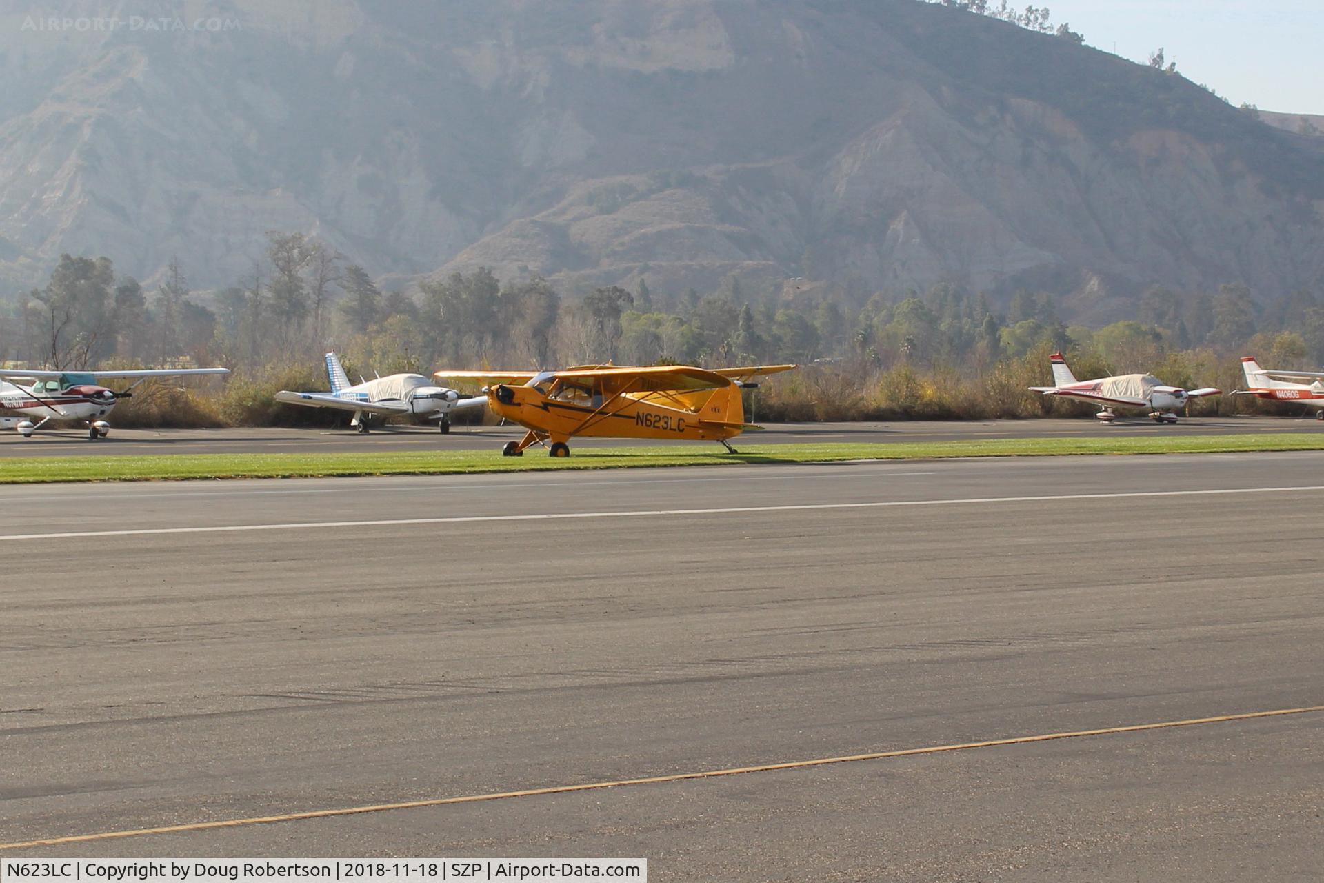 N623LC, 2006 American Legend AL3C-100 C/N AL-1024, 2006 American Legend Aircraft AL3C-100 CUB S-LSA, Continental O-200 100 Hp, open cowl version, landing roll Rwy 04R grass