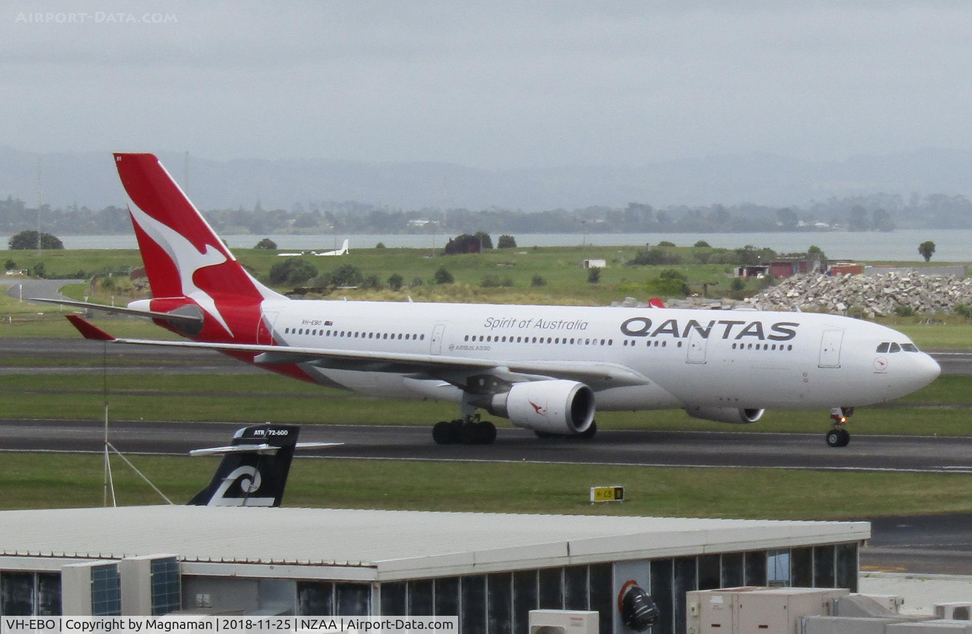 VH-EBO, 2010 Airbus A330-202 C/N 1169, from car park behind domestic terminal