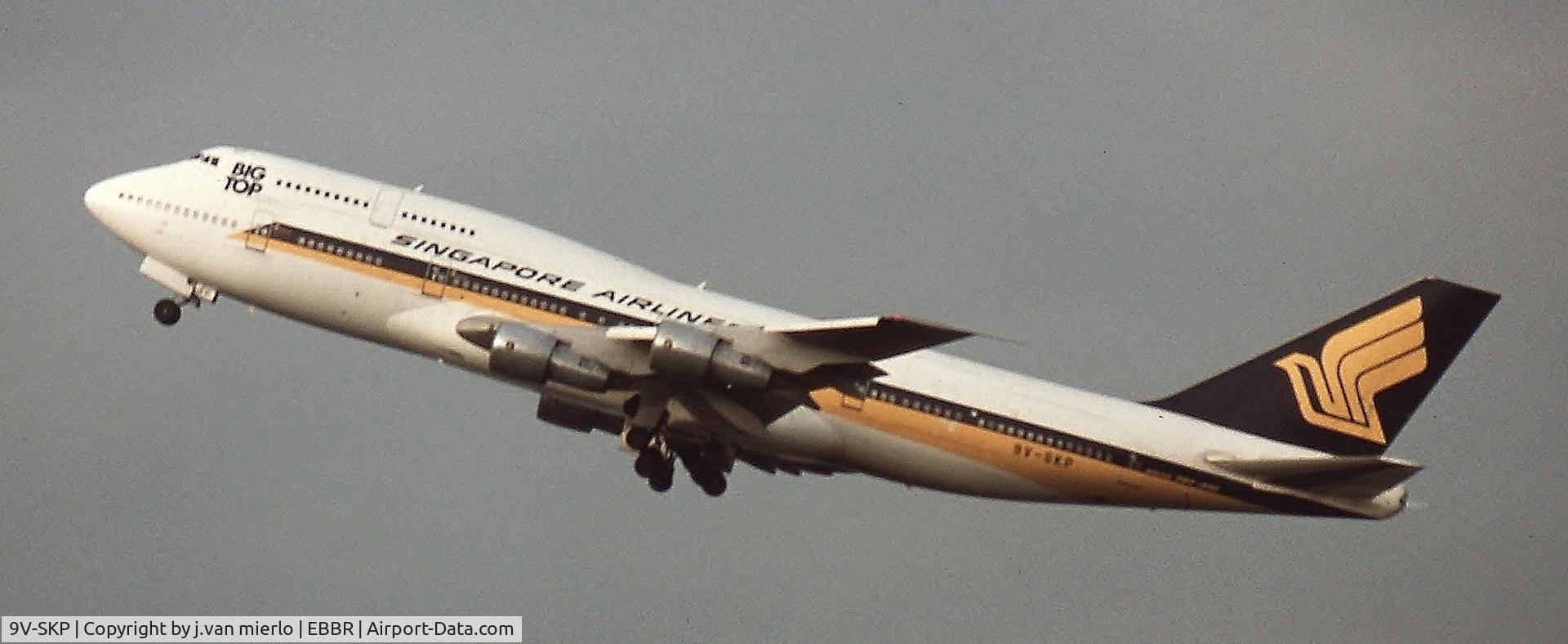9V-SKP, 1987 Boeing 747-312 C/N 23769, Climbing out of Brussels 25R