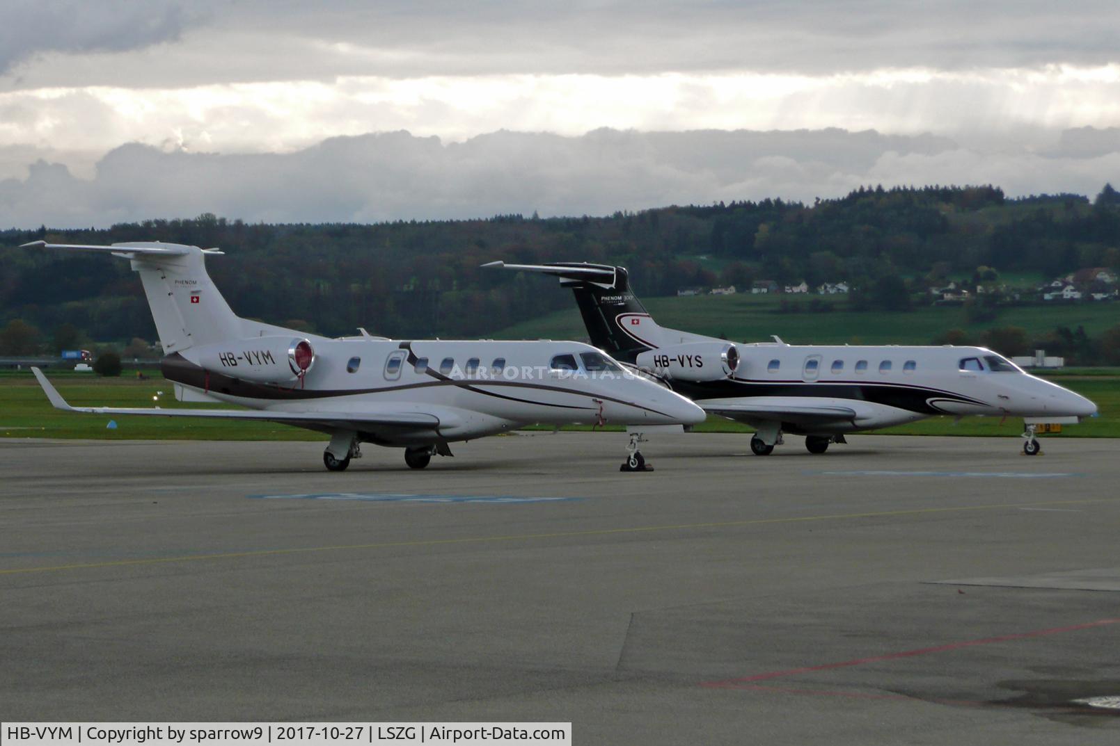 HB-VYM, 2010 Embraer EMB-505 Phenom 300 C/N 50500023, In good company. Grenchen airport.