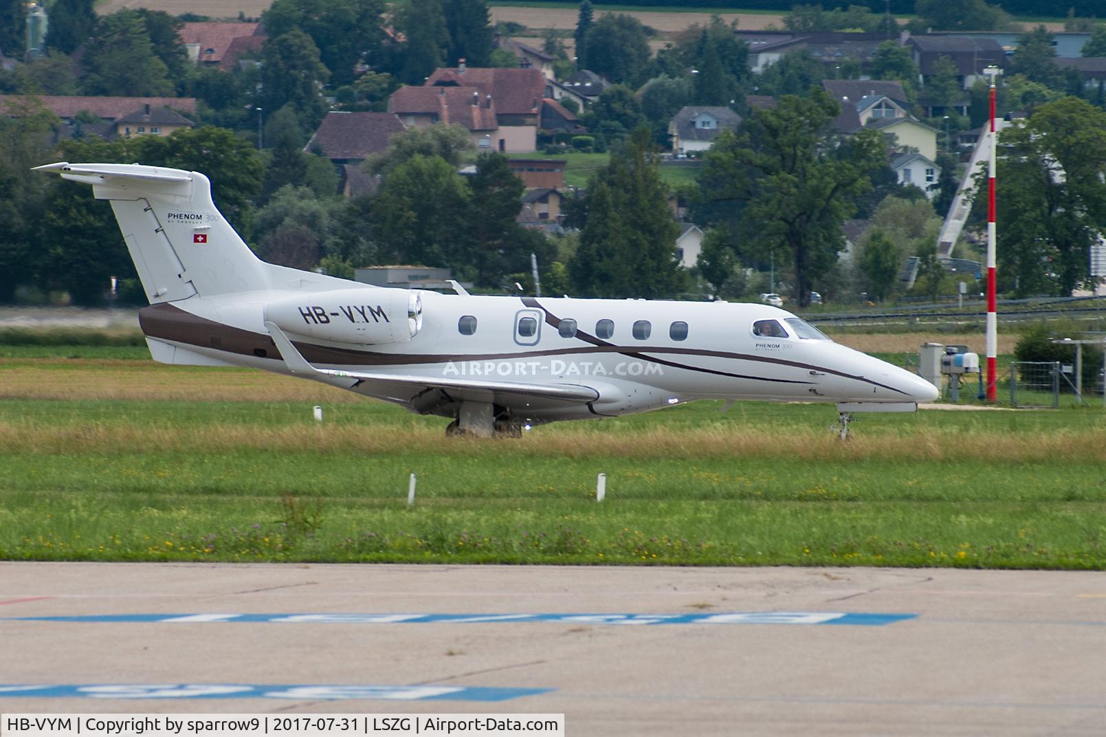 HB-VYM, 2010 Embraer EMB-505 Phenom 300 C/N 50500023, Landing runway 24 Grenchen airport.