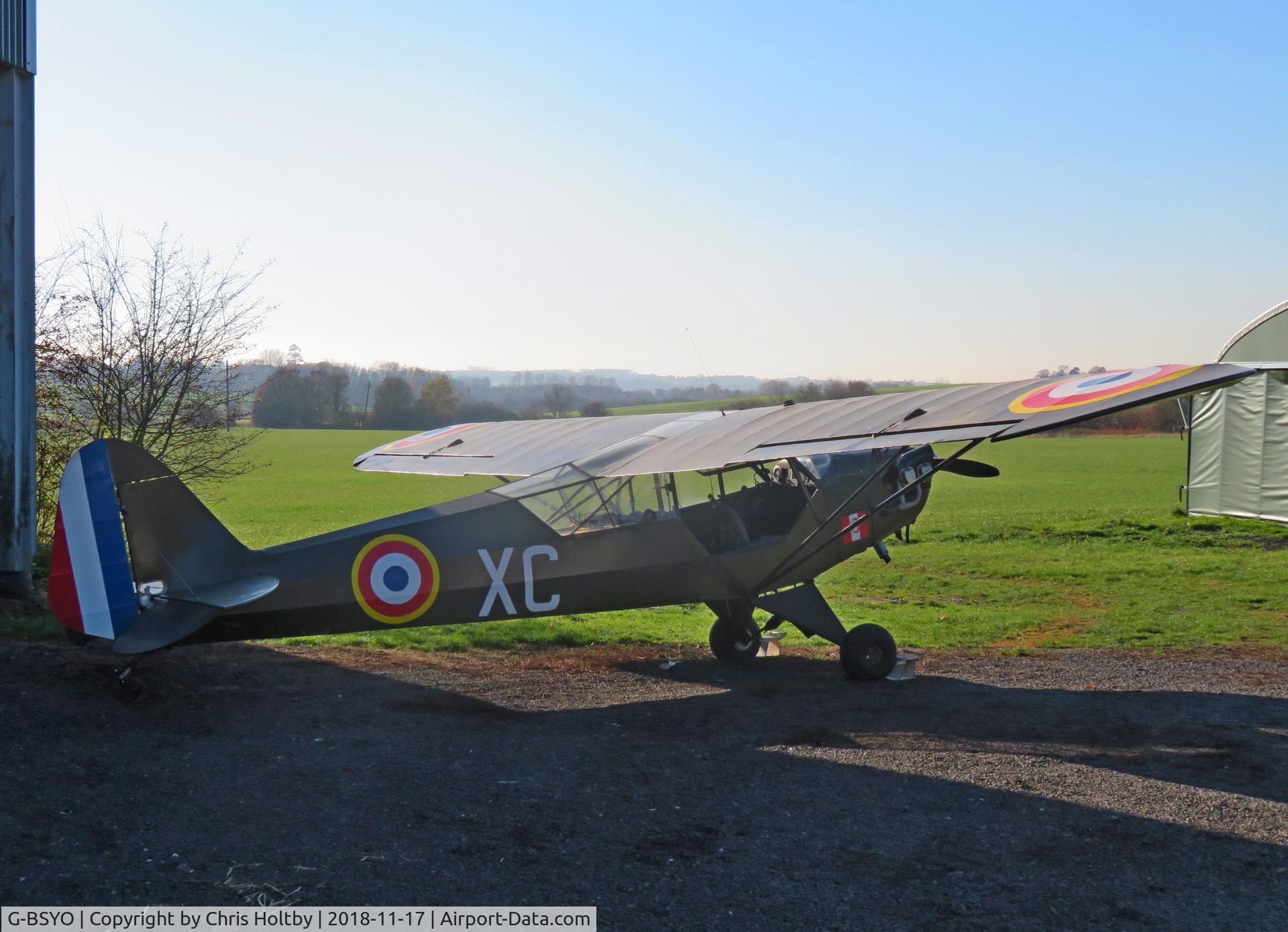 G-BSYO, 1942 Piper L-4J Grasshopper (J3C-65D) C/N 10244, Parked outside the hangar at Pent Farm. Underwent full restoration in 2014 including North African French Army paint scheme.