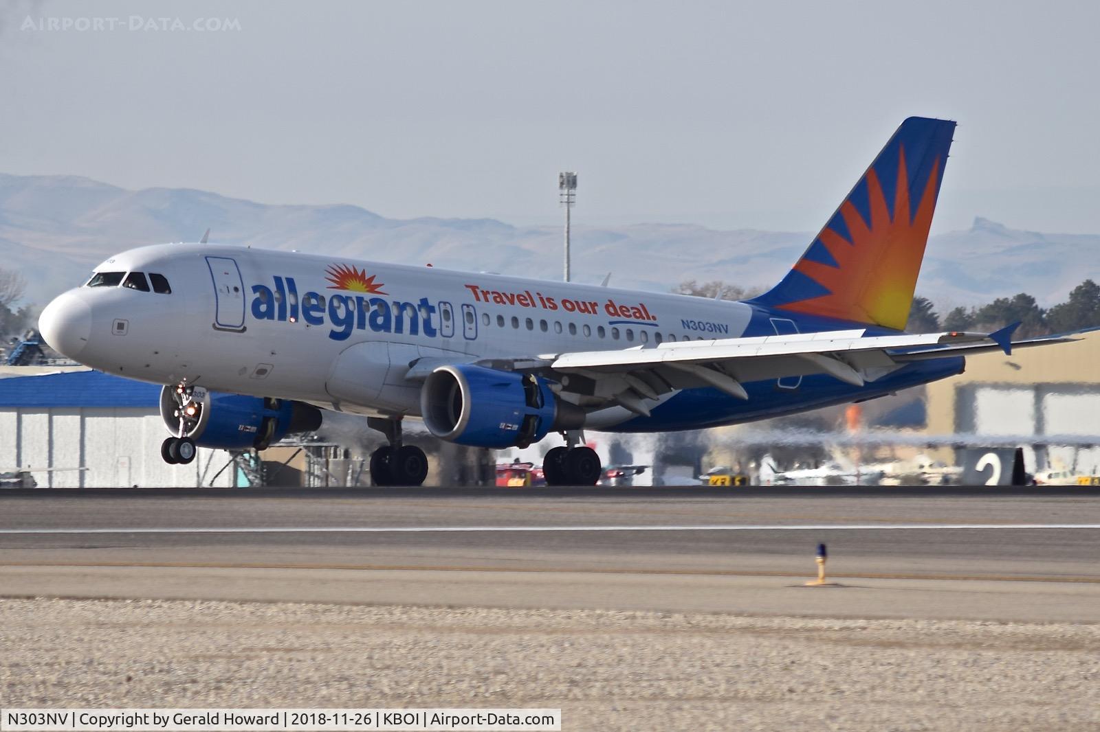 N303NV, 2004 Airbus A319-111 C/N 2271, Landing roll out on RWY 10R.
