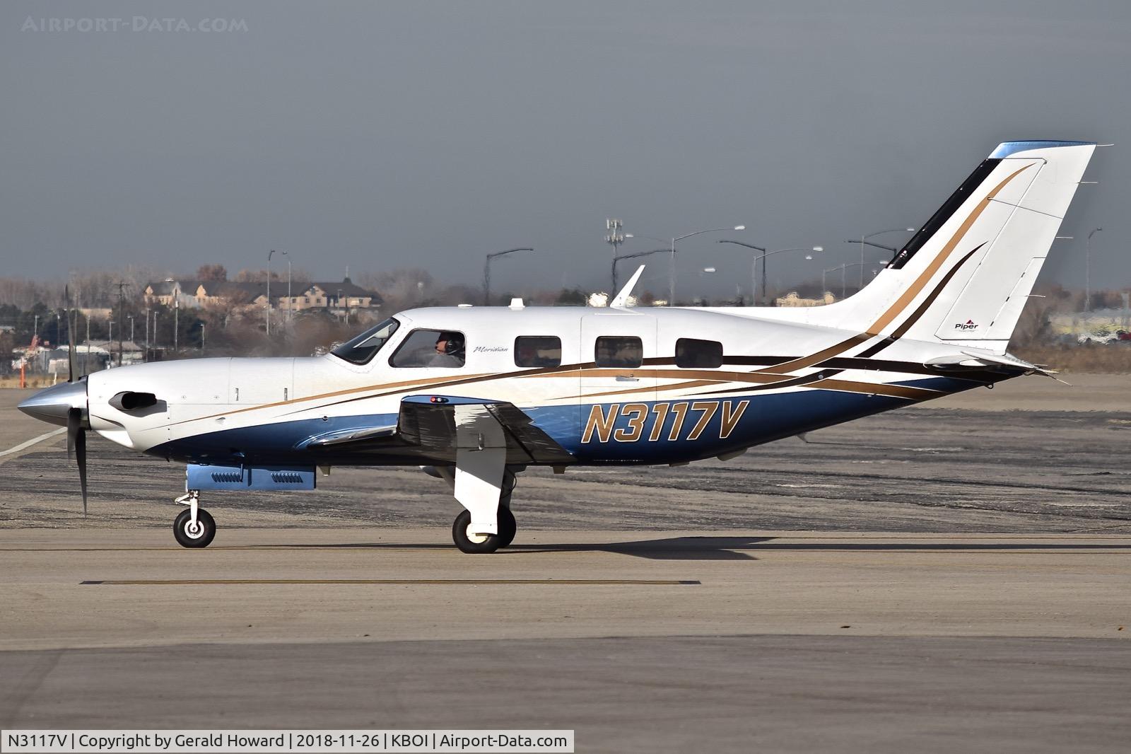 N3117V, 2005 Piper PA-46-500TP C/N 4697234, Taxiing off the north GA ramp.