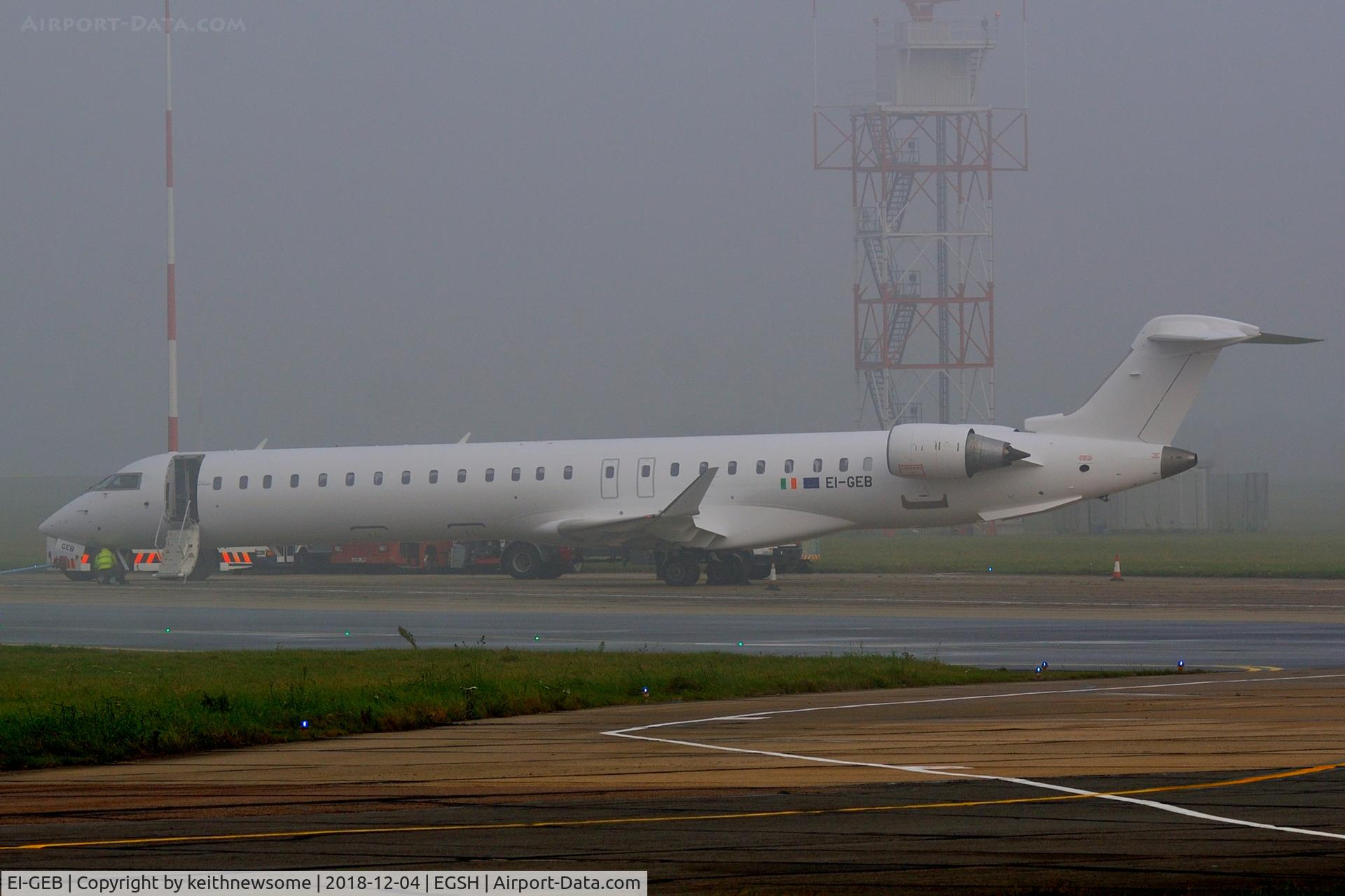 EI-GEB, 2009 Bombardier CRJ-900 (CL-600-2D24) C/N 15231, Preparing to leave foggy Norwich for Copenhagen.