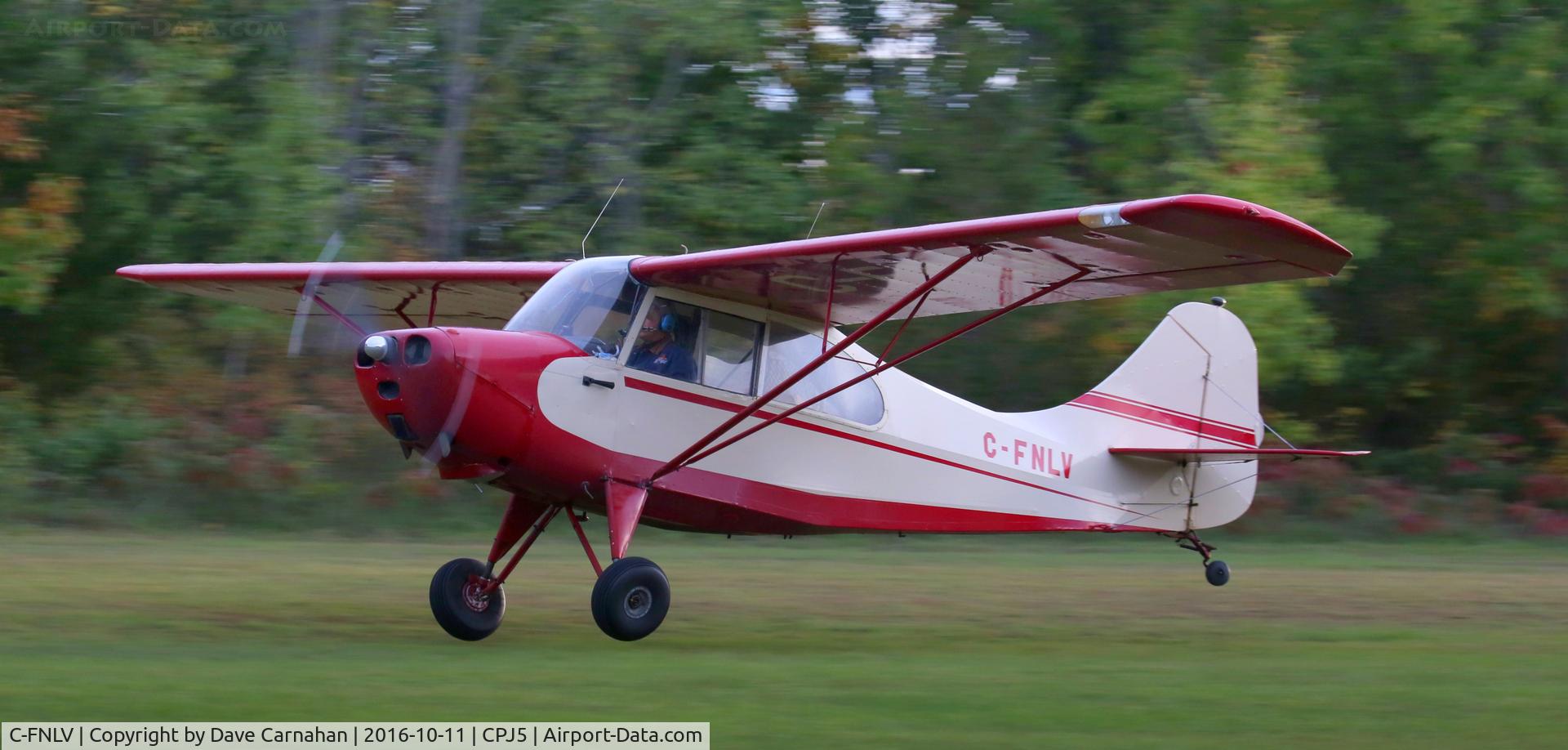 C-FNLV, 1961 Champion 7EC C/N 747, C-FNLV makes a soft touch down at Oak Hils Flying Club, Stirling, Ontario, Canada