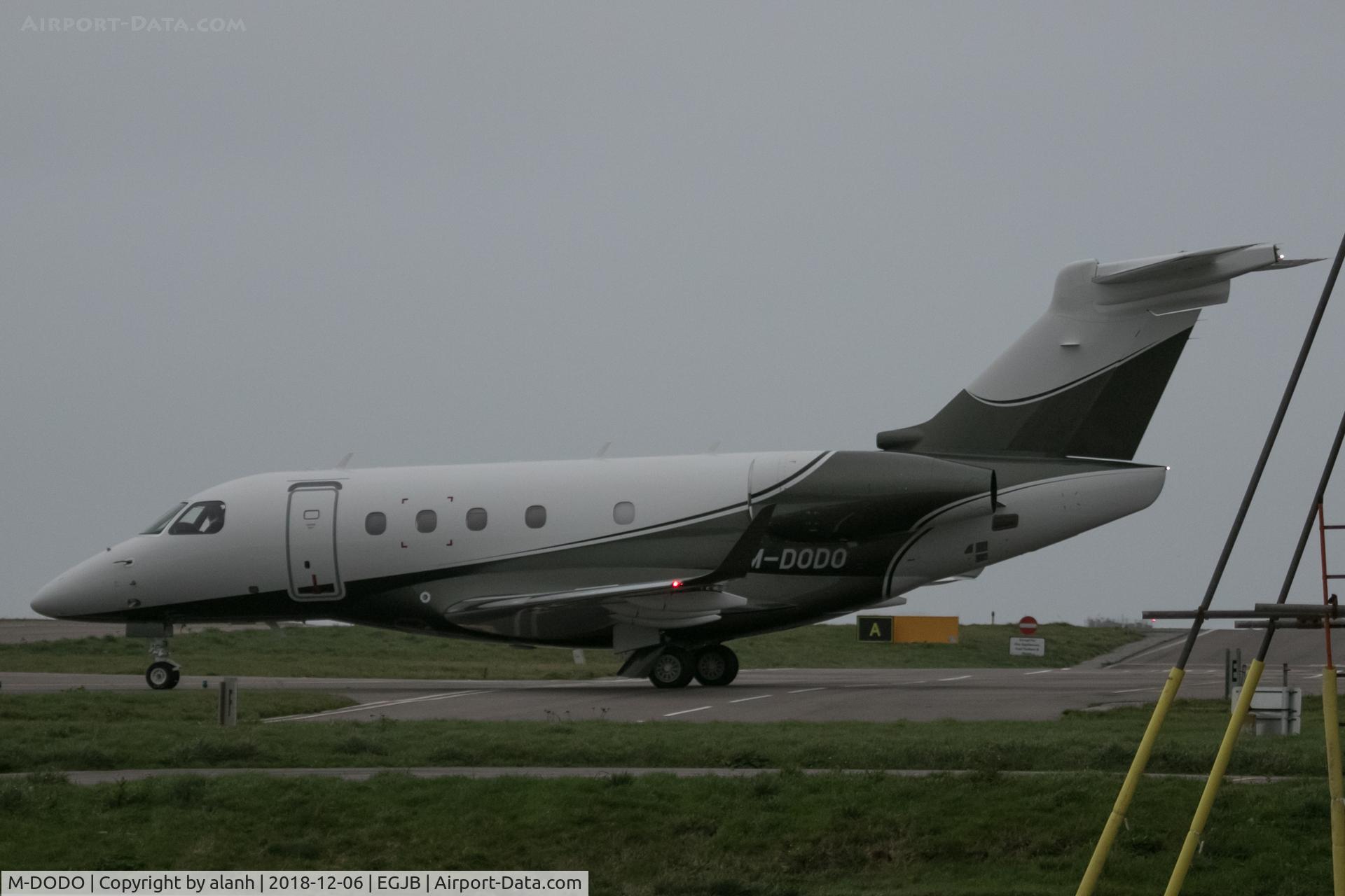 M-DODO, 2018 Embraer EMB-545 Legacy 450 C/N 55010051, Taxiing for departure from Guernsey