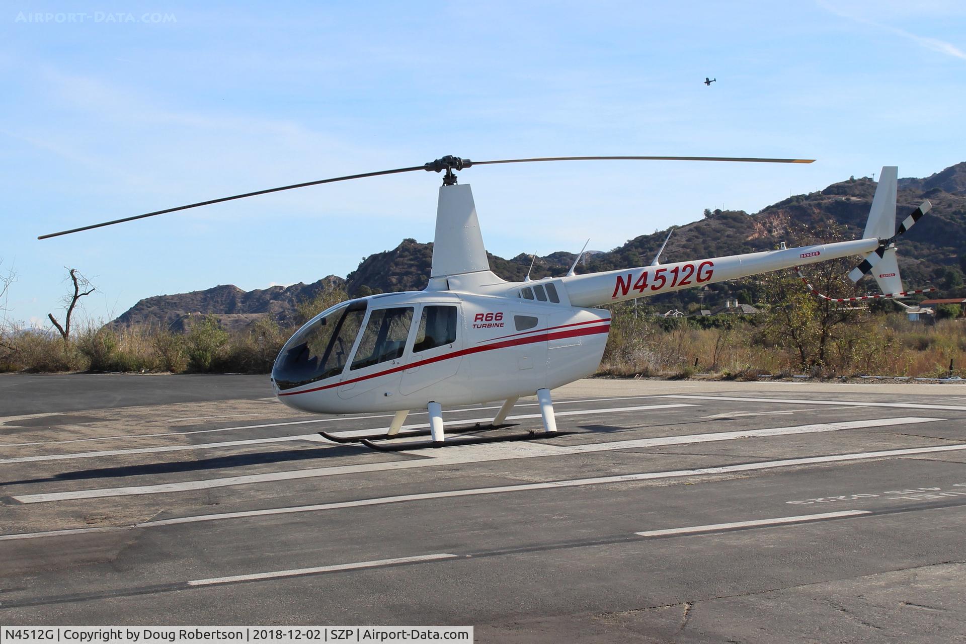 N4512G, Robinson R66 C/N 0003, 2010 Robinson R66, one Roll-Royce 250-C300/A1 Turboshaft derated to 270 sHp for takeoff, 224 sHp continuous. Experimental class, No.3 R66 build. On SZP Helipad.