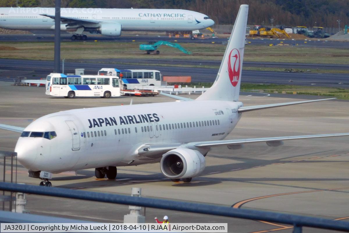 JA320J, 2009 Boeing 737-846 C/N 35349, At Narita