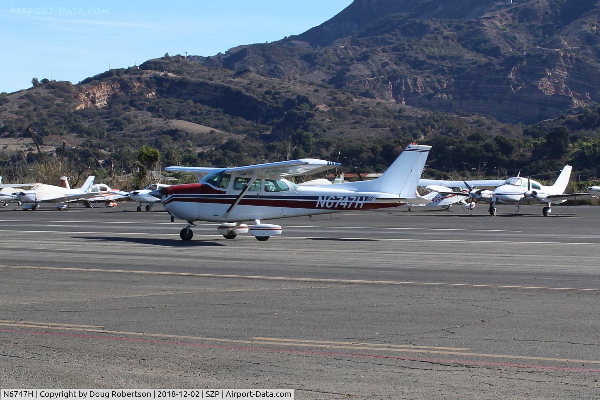 N6747H, 1975 Cessna 172M C/N 17265564, 1975 Cessna 172M SKYHAWK, Lycoming O-320-E2D 150 Hp, taxi off the active