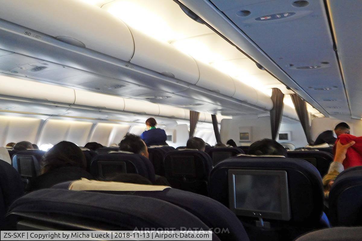 ZS-SXF, 2005 Airbus A340-313E C/N 651, The old A340-300 has excellent legroom in Y (HKG-JNB)