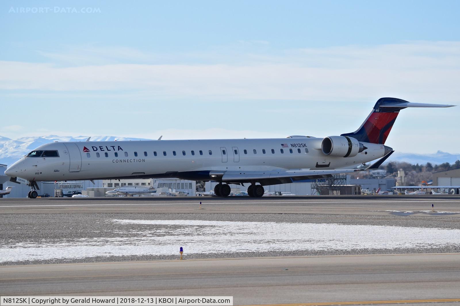 N812SK, 2006 Bombardier CRJ-900ER (CL-600-2D24) C/N 15098, Landing roll out on RWY 10L.