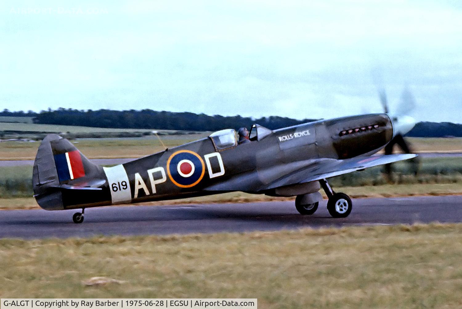 G-ALGT, 1944 Supermarine 379 Spitfire F.XIVc C/N 6S/432263, G-ALGT   (RM619) Supermarine Spitfire F.XIVc [6S/432263] Duxford~G 28/06/1975. From a slide.