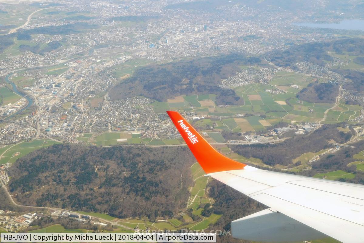 HB-JVO, 2009 Embraer 190LR (ERJ-190-100LR) C/N 19000294, Turning South, with a beautiful view over Zurich (ZRH-FLR)