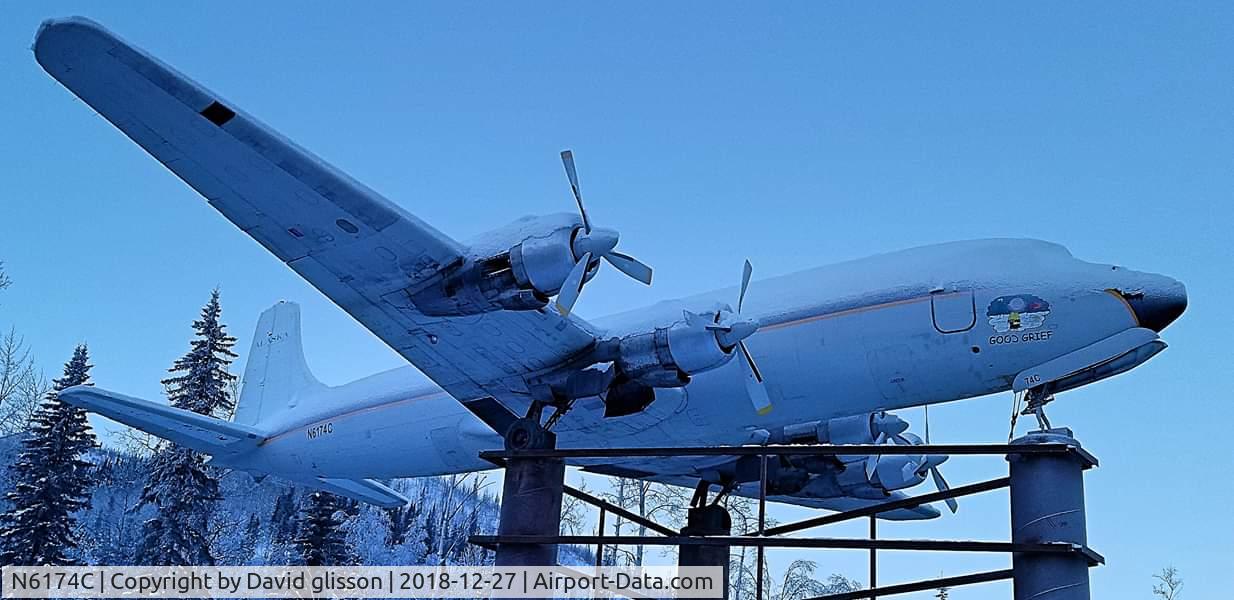 N6174C, 1954 Douglas DC-6A C/N 44075, Mounted at chena hot springs. Was doing research why it's up on display like this to no avail.