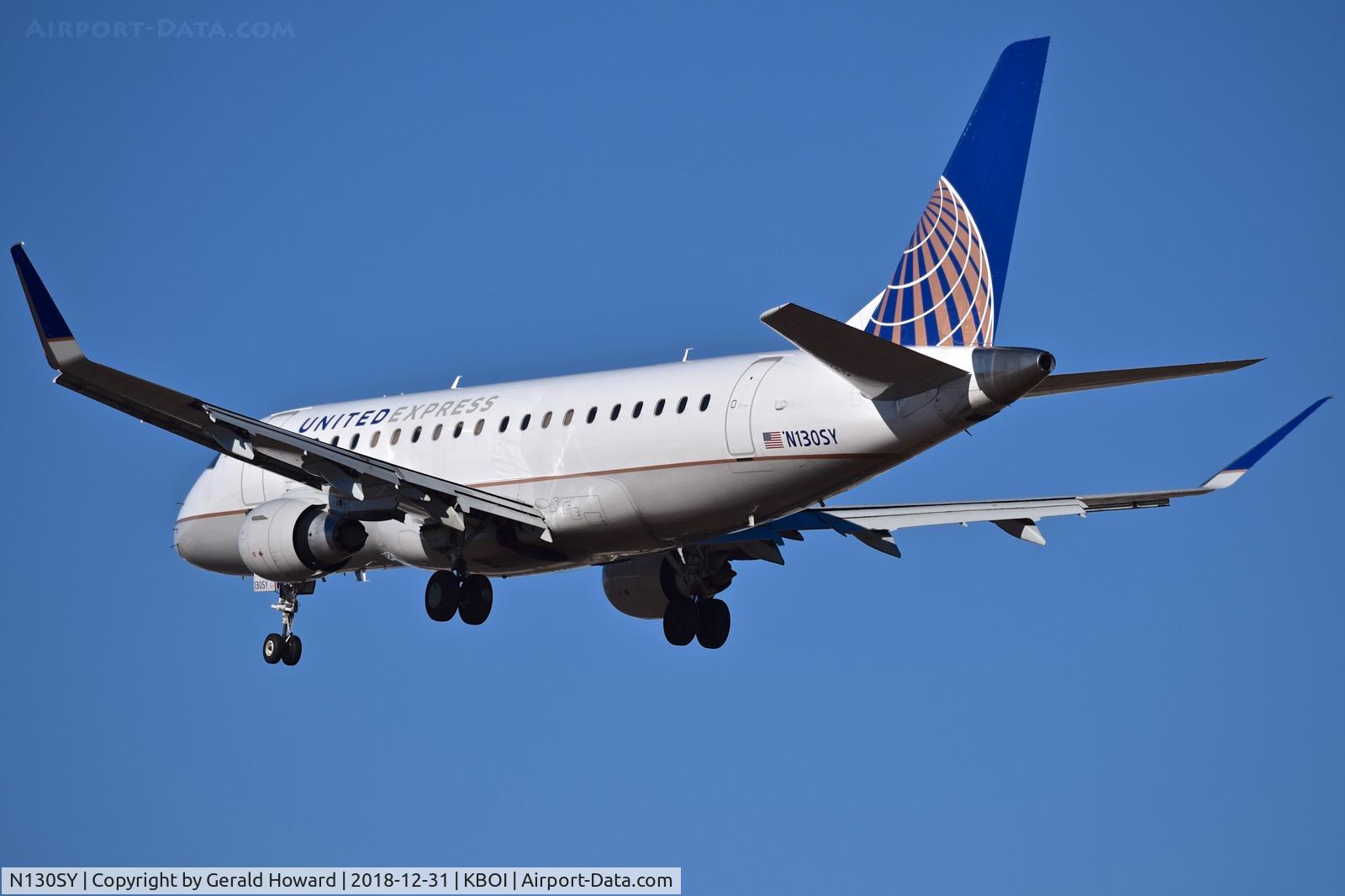 N130SY, 2015 Embraer 175LR (ERJ-170-200LR) C/N 17000449, Landing RWY 28R.
