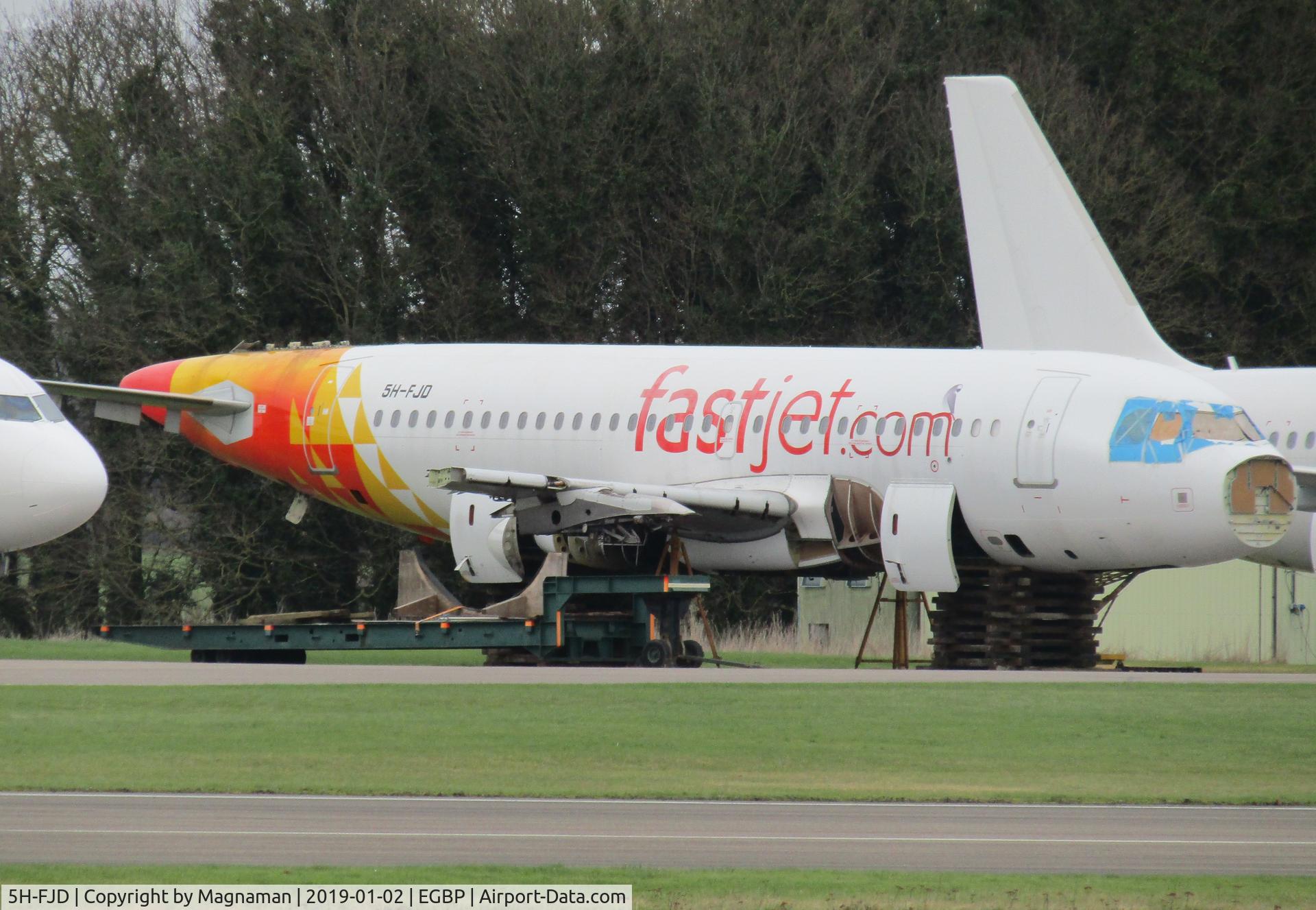 5H-FJD, 2004 Airbus A319-132 C/N 2268, At Kemble on its last legs - only my second sighting of a tanzanian.