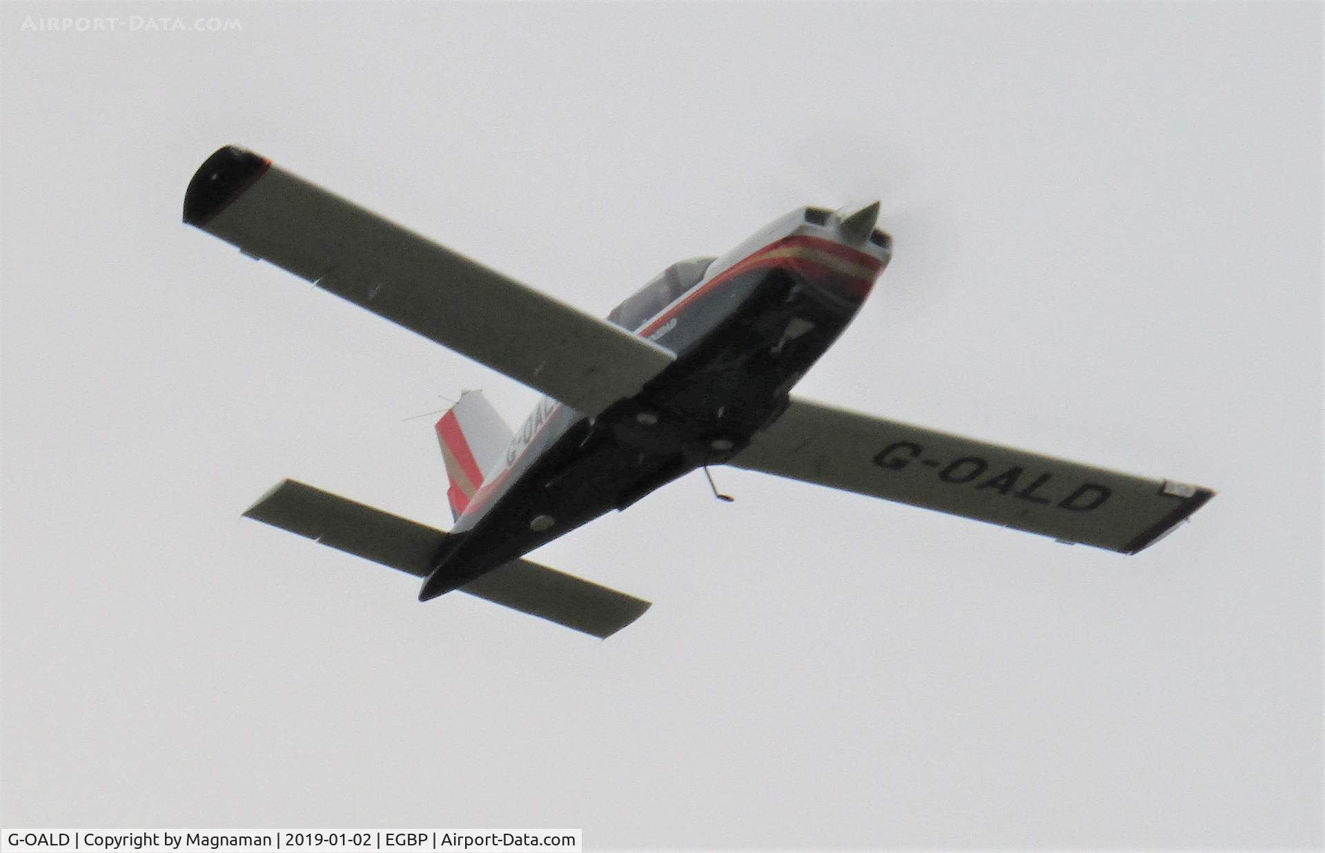 G-OALD, 1985 Socata TB-20 Trinidad C/N 490, departing Kemble on dull winter's day