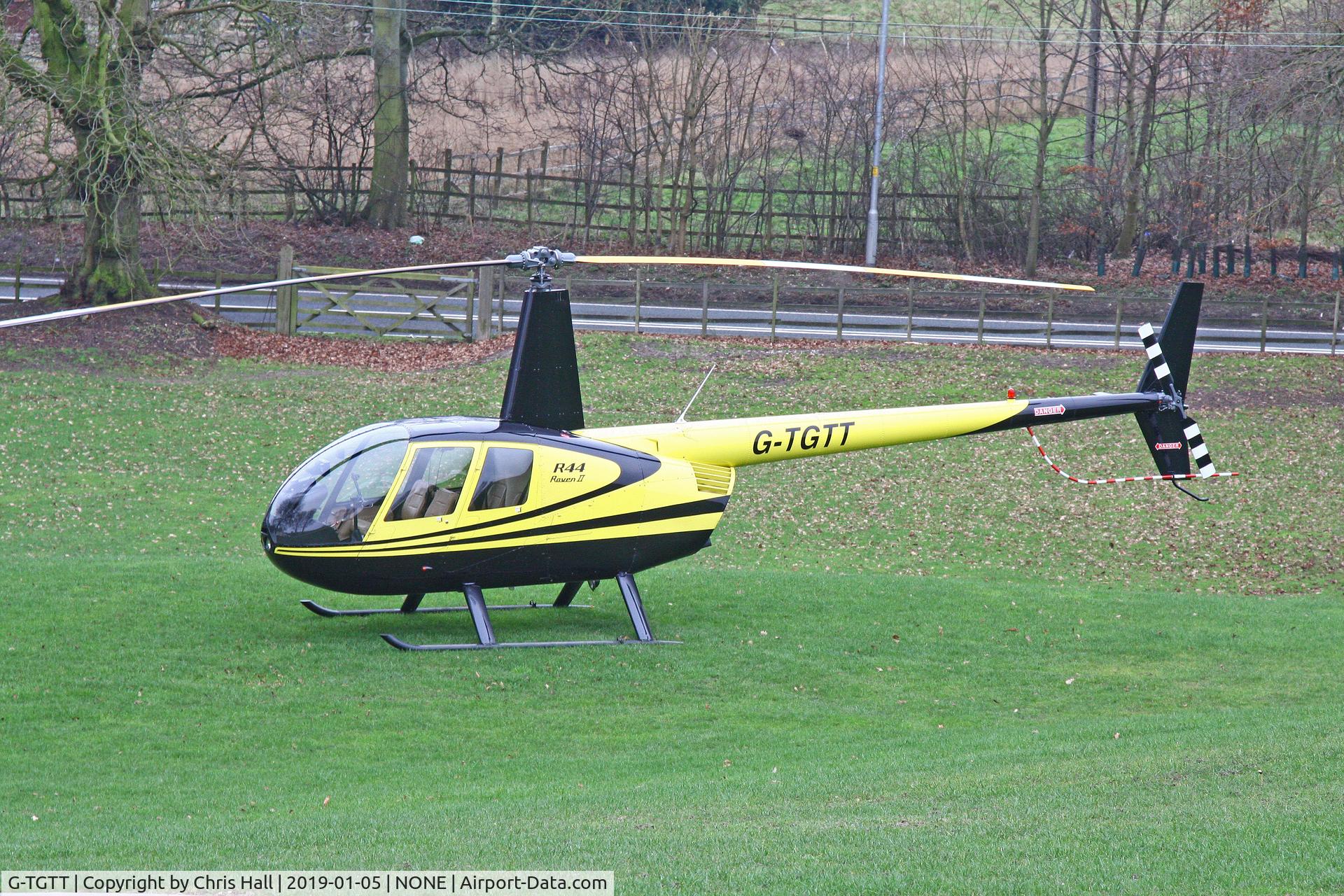 G-TGTT, 2002 Robinson R44 Raven II C/N 10023, at a private site before our flight to North Coates