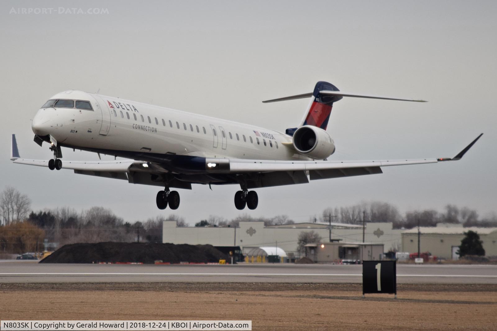 N803SK, 2006 Bombardier CRJ-900ER (CL-600-2D24) C/N 15062, Landing RWY 10L.